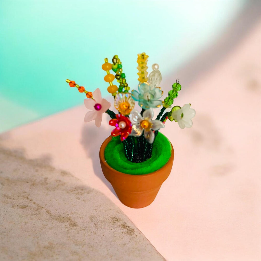 Beaded flower in Mini clay pot